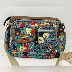 Lily Bloom “Who Let The Dogs Out” patterned crossbody bag